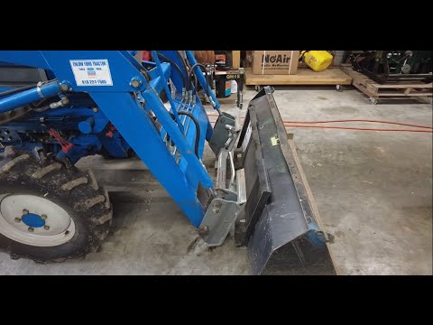 Skidsteer Quick Connect on the 1920 Ford New Holland, 7108 Front loader