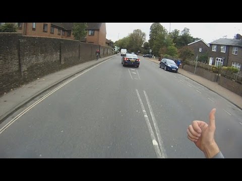 DC63AUV - MGIF Past Indicating Cyclist