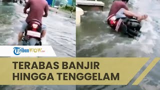 Viral Video Pemotor Nekat Terabas Banjir Malah Jatuh hingga Tenggelam ke Dalam Selokan