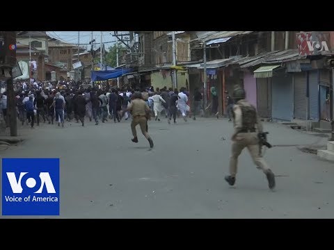 Police clash with protesters in Kashmir