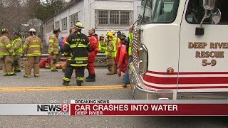 Person dies after car rolls over into body of water in Deep River