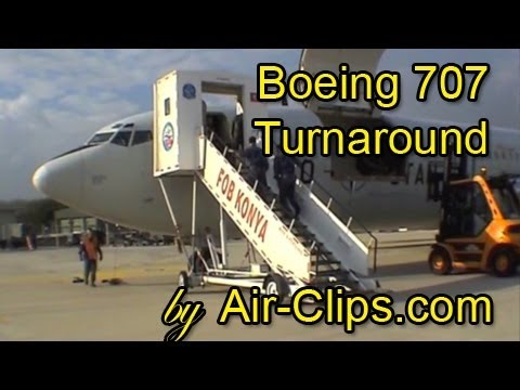 NATO Boeing 707 Combi (pax & cargo) being offloaded and loaded during a trunaround. [AirClips]