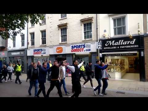 Lincoln Football Fans Make Some Noise In Peterborough City Centre