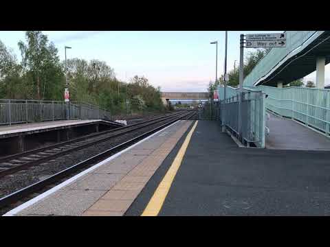 DRS 66421 passing Tewksbury train station working Wentloog (Freightliners) to Daventry Drs (Tesco)
