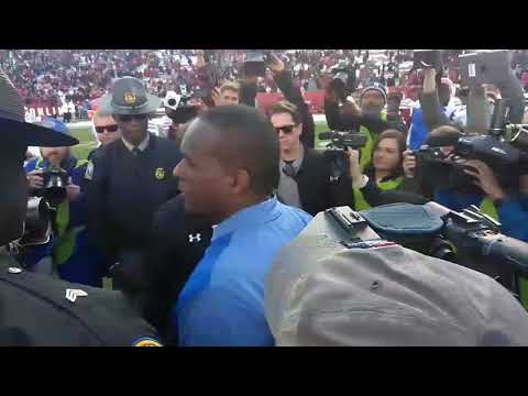 Florida players greet former coach Will Muschsmp after loss to South Carolina
