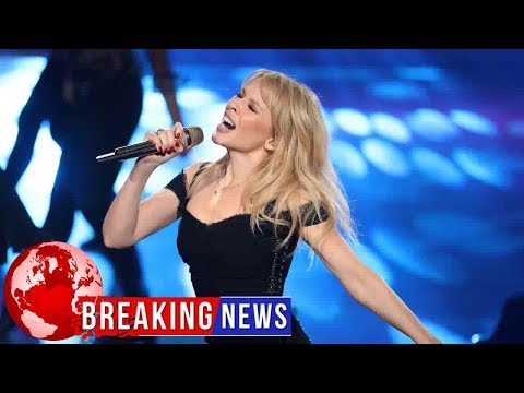 Kylie Minogue's surprise for 8-year-old twins who sang Dancing to their dying mum