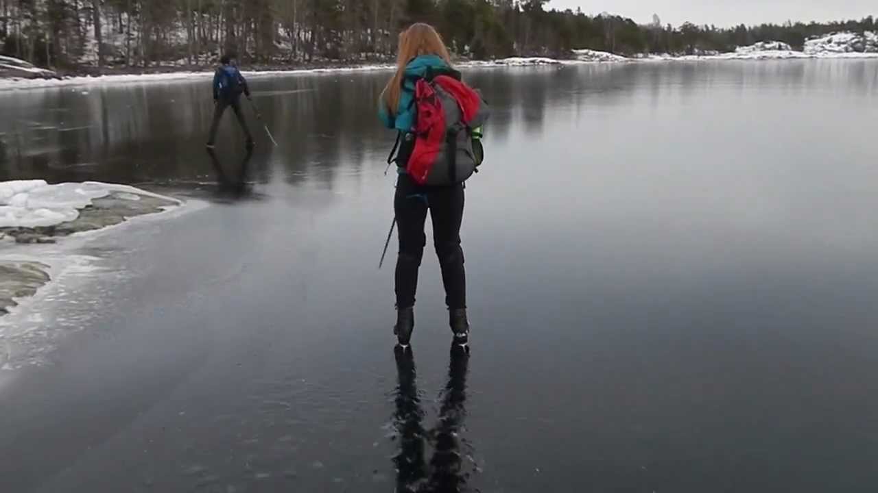 Fearless skating on thin ice with loud sounds of cracking ice