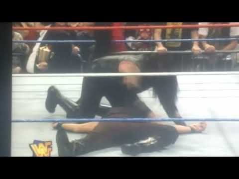 The Phenom Spikes Mankind with Tombstone Piledriver for a 1,2,3 in No Holds Barred - The Undertaker