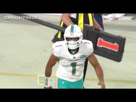 Ryan Fitzpatrick and Tua Tagovailoa celebrate