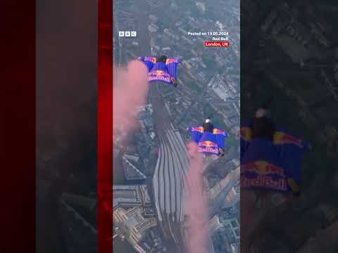 Skydivers complete wingsuit flight through London's Tower Bridge in world first. #Skydiving #BBCNews
