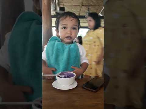 carlos eating Ube Ice cream