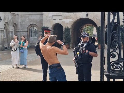 HE TAKES OFF HIS SHIRT AND WANTS TO SPAR THE CORPORAL AND ARMED POLICE #horseguardsparade