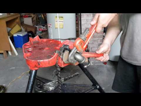 Diy gas pipe applying pipe dope and tighten fitting