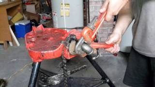 Diy gas pipe applying pipe dope and tighten fitting