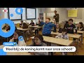 Juichende kinderen op de school waar Koningsspelen worden geopend