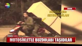 Motosikletle buzdolabı taşıdılar