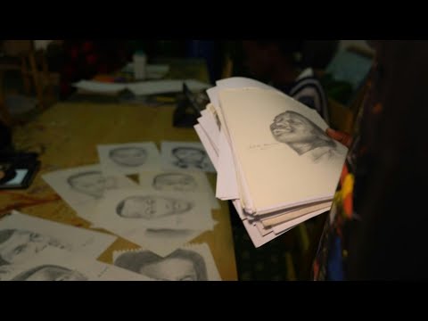 Video Thumbnail: Young Rwandan artists remember genocide victims through portraits | AFP