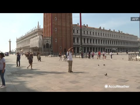People return to Venice's St Mark's Square as travel restrictions ease
