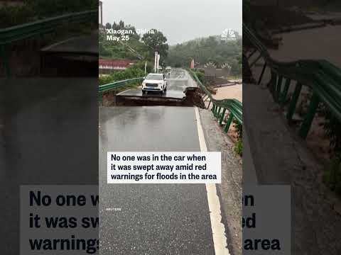 Car plunges into fast-moving river in China