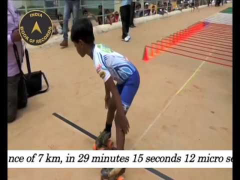 YOUNGEST TO PASS UNDER THE BAR IN LIMBO SKATING