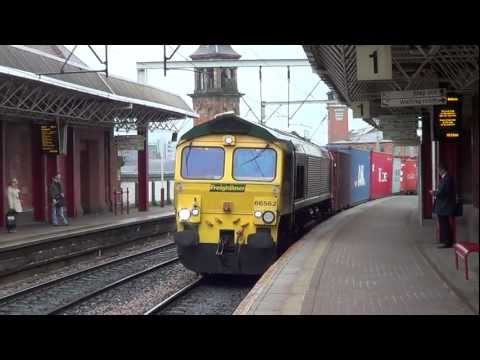 Freightliner freight train pulled by Class 66 in Manchester Deansgate