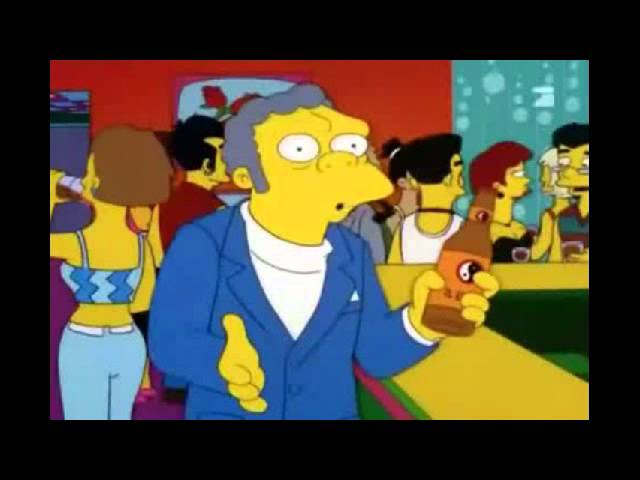 Vídeo relacionado con Vanilla Underground The Simpsons Camiseta Beige con Estampado de Moe Szyslak de Los Simpson | Camiseta de Manga Corta para Hombre con Estampado de la Taberna de Moe Drink Up Champs