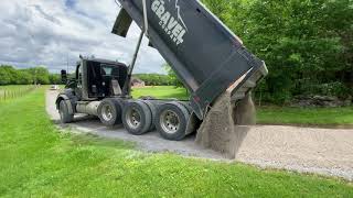 Kenworth t880 Dump Truck Spreading Crusher Run Gravel