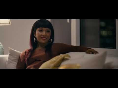 Official Hustlers trailer frame: Ramona steps onto the stage; the club roars