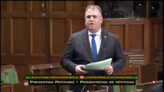 Gord Johns presents electoral reform petition
