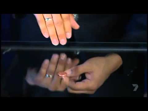 Magic Revealed - Coin Through glass table!!! - MUST WATCH