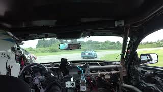 Brandon driving the SakaiLMS.org LearnerPrivacy Mustang at 24 Hours of Lemons