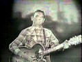 Merle Travis performs "Nine Pound Hammer" on ...