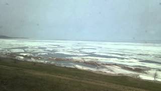 preview picture of video 'Lake Baikal with Ice, viewed from Train (between Ulan-Ude and Irkutsk)'