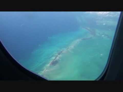 Flying over Cuba and Beautiful Blue Waters of Caribbean Sea