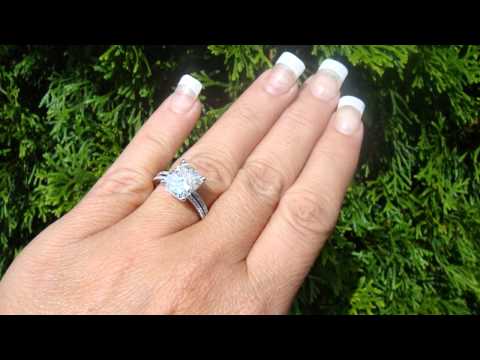 M4H06965 3.07 H vs2 cushion center 4.07ct TOTAL in the  set EGL Certified