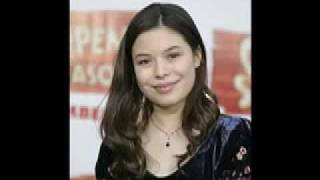 Headphones on- Miranda Cosgrove
