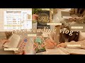 cosy reading vlog 🫖🌼 unboxing bookish mail, writing in cafés & my notion library set-up