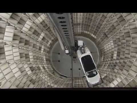 Super car video Two gleaming glass towers of volkswagens..