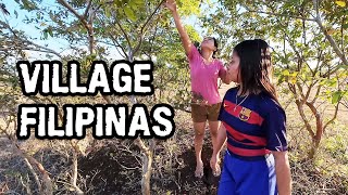 Village Filipinas "Borrow" Guavas, Supper from a Roadside Barbecue Shack, and a Magic Cotton Tree!