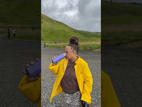 Ma Dukes Drinks Fresh River Water Downstream From Skogafoss Waterfall in Iceland