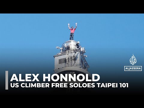 US climber Alex Honnold scales Taipei 101 skyscraper in free solo climb
