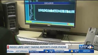 Inside LRPD Unit Taking Reports Over Phone