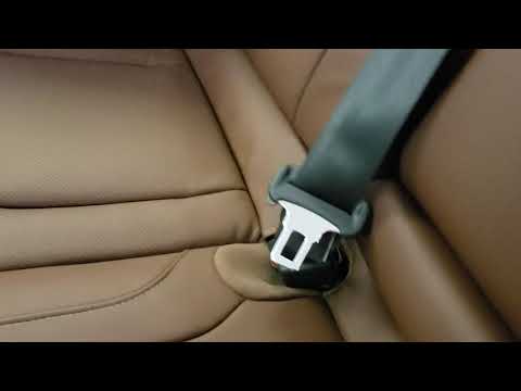 Undo center seatbelt in back seat of a Subaru
