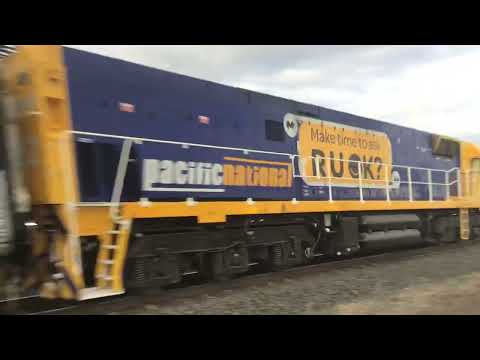 NR52 in (RUOK) livery on 5AM8 the Overland at Gheringhap heading to Melbourne 15/9/2022