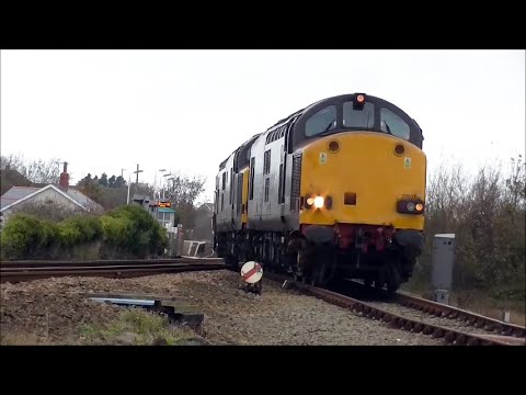 Valley, Anglesey. DRS Class 37s on nuclear flasks;  Class 37 on RHTT, and other passing trains.
