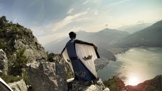 Crazy Wingsuit Flight -- Man Lands on Water Without Parachute?