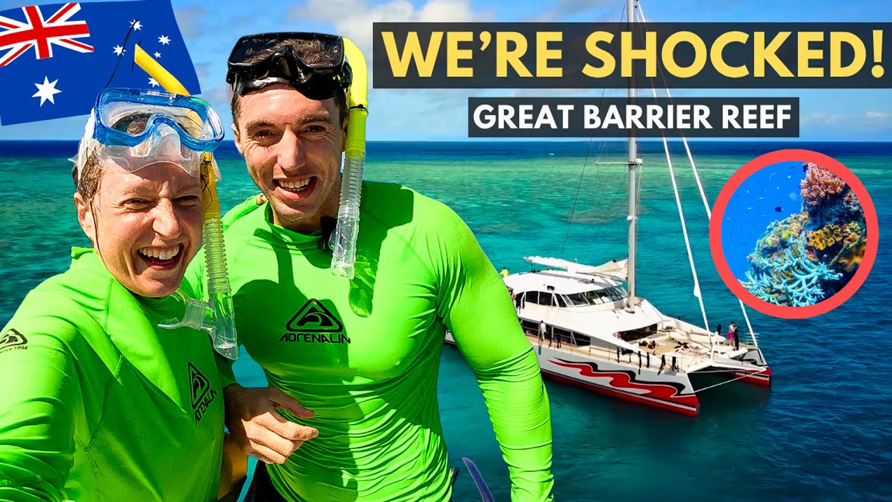 Join a duo as they snorkel coral gardens at Great Barrier Reef.