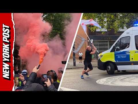 Police clash with anti-immigration protesters outside hotel housing asylum seekers