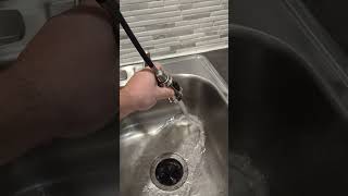 Demonstration of the functions of my new faucet.  You will notice a hesitation when I pulled down on the hose.  This was because the weight on the hose was being blocked by the pipes below the sink. The hose was rerouted and pulls out very smooth now.
