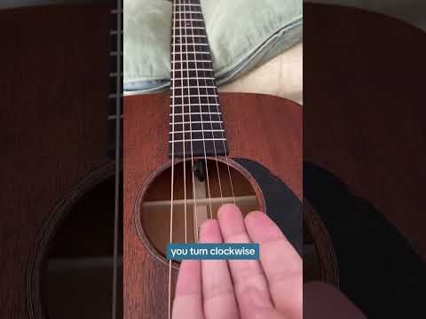 Truss rod adjustment on an acoustic Martin guitar